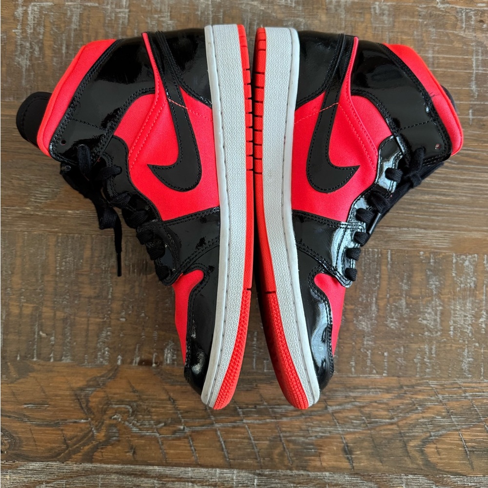 Women’s Nike Air Jordan 1 Mid "Hot Punch” Red and Black Tennis Shoes, Size 9